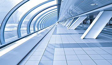 Curved glass reflecting on clean floor.